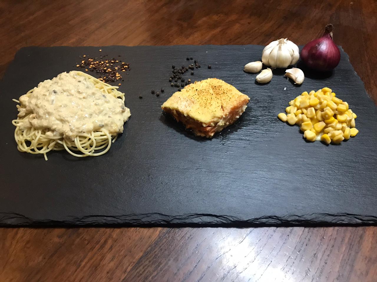Lenten Special composed of baked salmon, crabmeat pasta and creamed corn.
